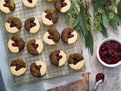 Chocolate-Dipped Raspberry Linzer Cookies